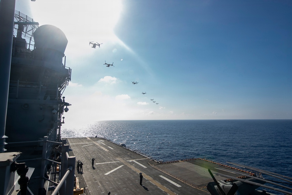 USS Tripoli Conducts MV-22 Osprey Fly-Over