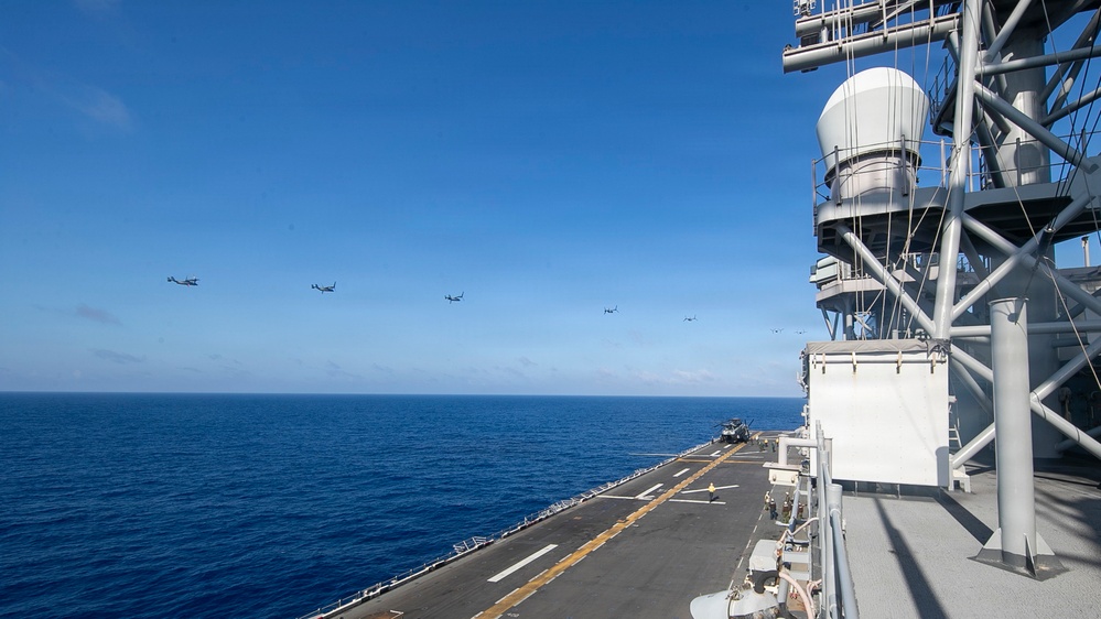 USS Tripoli Conducts MV-22 Osprey Fly-Over