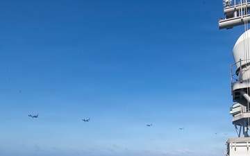 USS Tripoli Conducts MV-22 Osprey Fly-Over