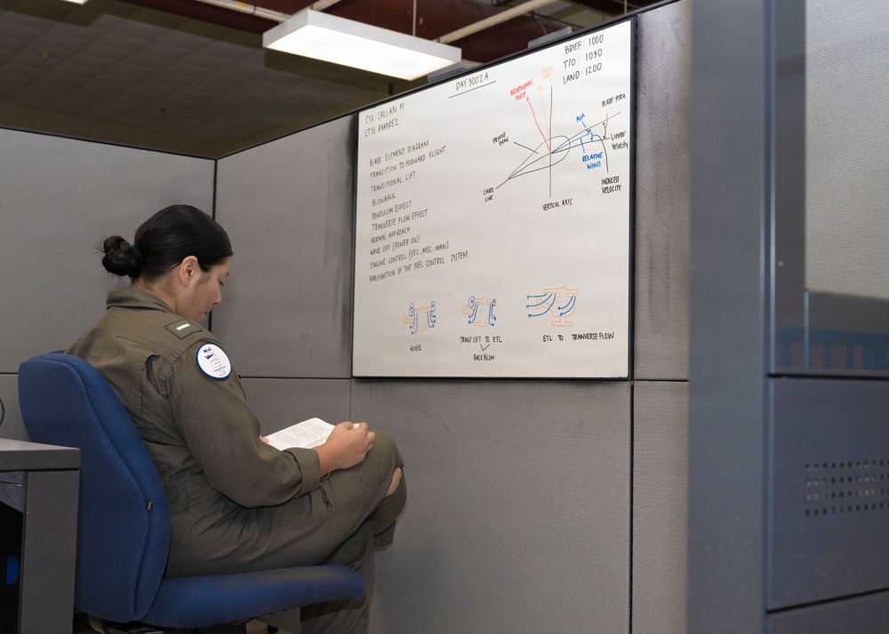 HT28 Student Naval Aviator Prepares for Flight Simulation Training