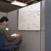HT28 Student Naval Aviator Prepares for Flight Simulation Training