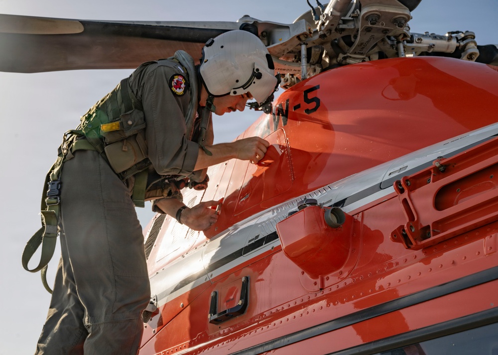HT-28 Student Naval Aviator Performs Pre-Flight Inspection of TH-73A Thrasher