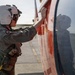 HT-28 Student Naval Aviator Performs Pre-Flight Inspection of TH-73A Thrasher