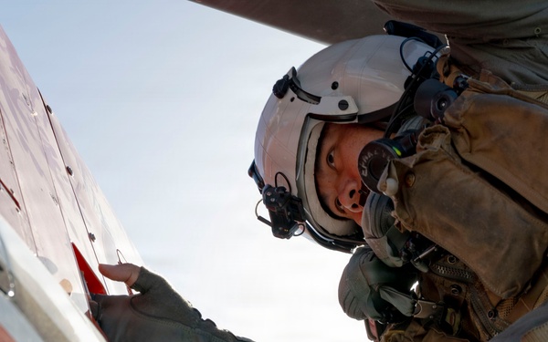 HT-28 Student Naval Aviator Performs Pre-Flight Inspection of TH-73A Thrasher