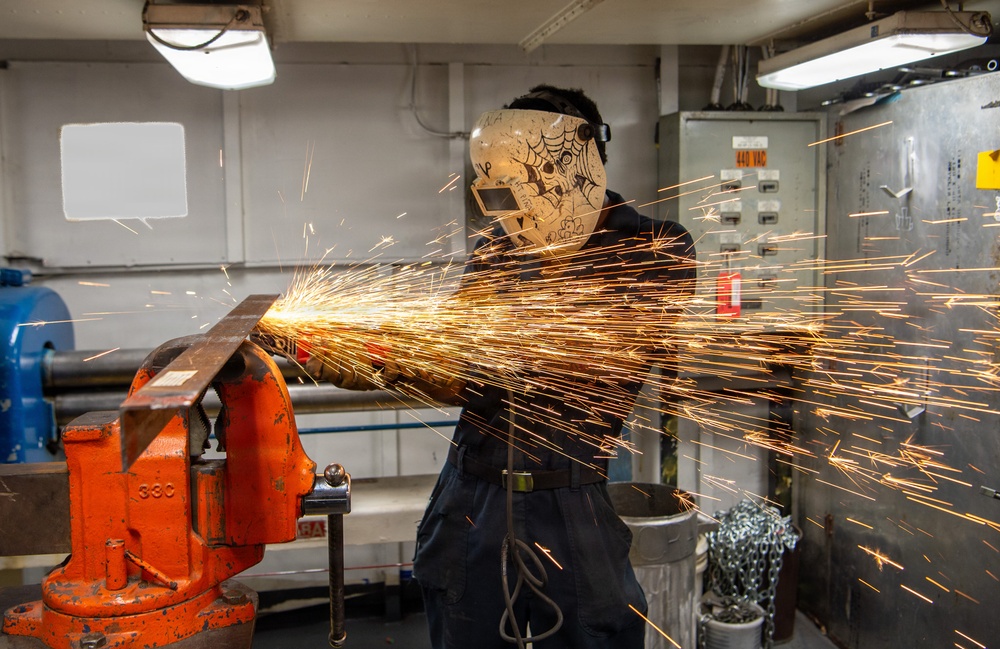 USS John C. Stennis Hull Maintenance Technician Creates a Spark