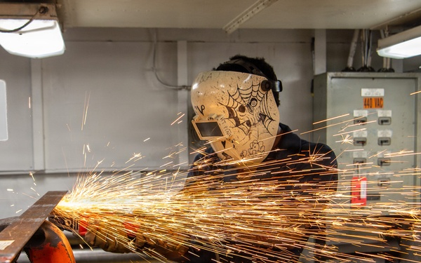USS John C. Stennis Hull Maintenance Technician Creates a Spark