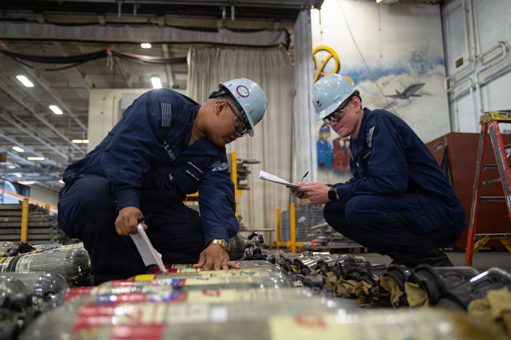 Ronald Reagan Sailors Conduct Maintenance
