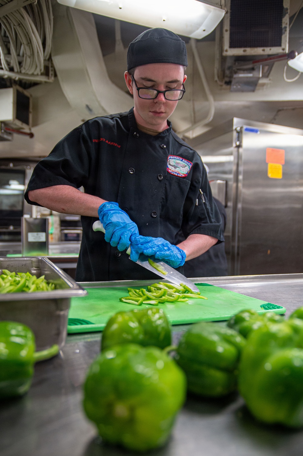 Ronald Reagan Sailors Prepare Food For Taco Tuesday