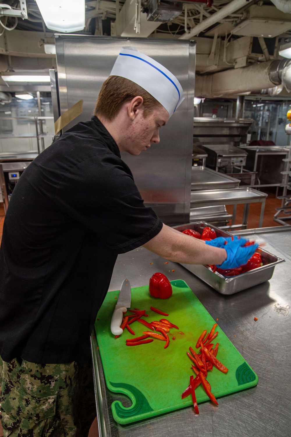 Ronald Reagan Sailors Prepare Food For Taco Tuesday