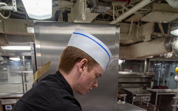 Ronald Reagan Sailors Prepare Food For Taco Tuesday