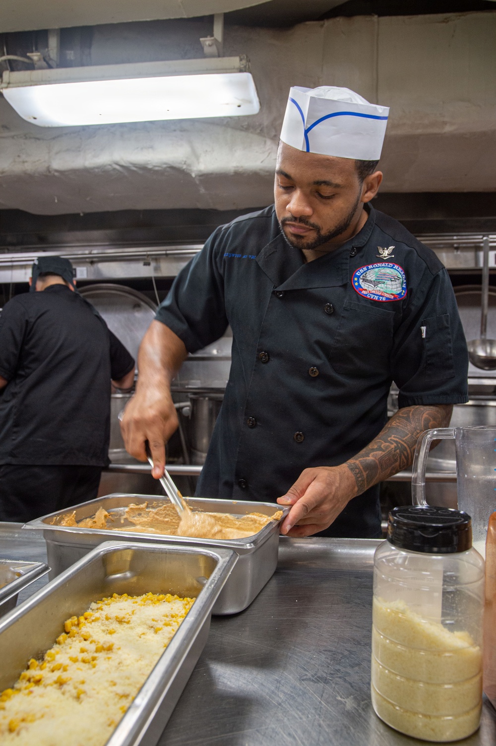 Ronald Reagan Sailors Prepare Food For Taco Tuesday