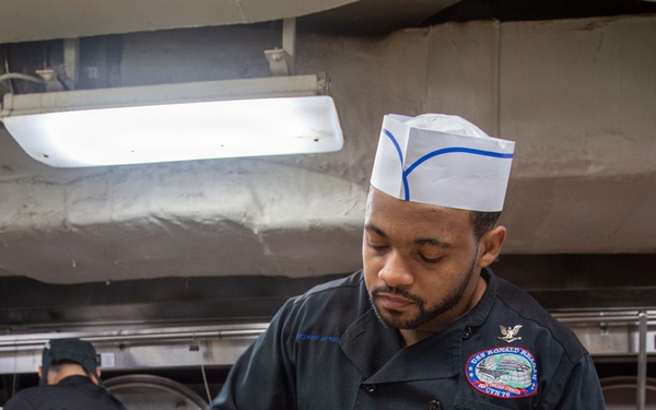 Ronald Reagan Sailors Prepare Food For Taco Tuesday