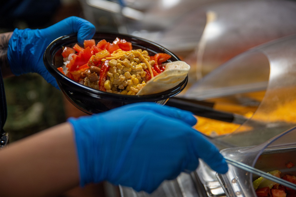 Ronald Reagan Sailors Prepare Food For Taco Tuesday