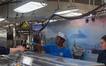 Ronald Reagan Sailors Prepare Food For Taco Tuesday