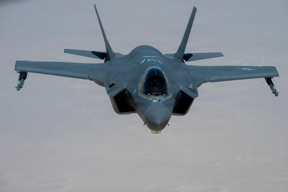 KC-135 refuels fighter aircraft in the CENTCOM area of responsibility