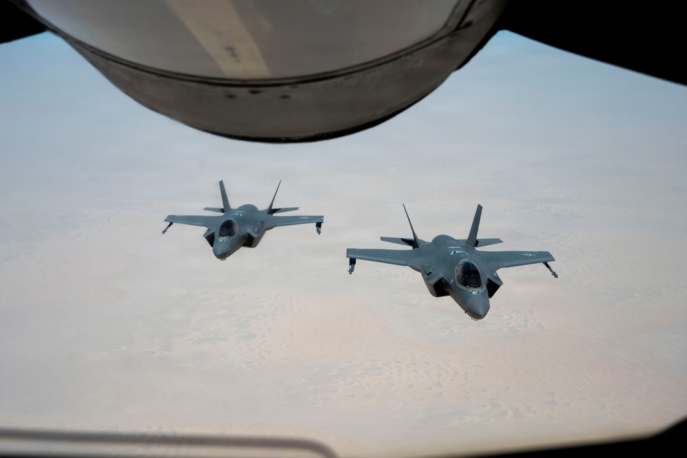 KC-135 refuels fighter aircraft in the CENTCOM area of responsibility