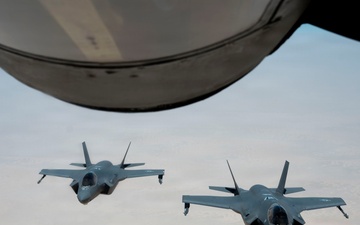 KC-135 refuels fighter aircraft in the CENTCOM area of responsibility