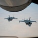 KC-135 refuels fighter aircraft in the CENTCOM area of responsibility