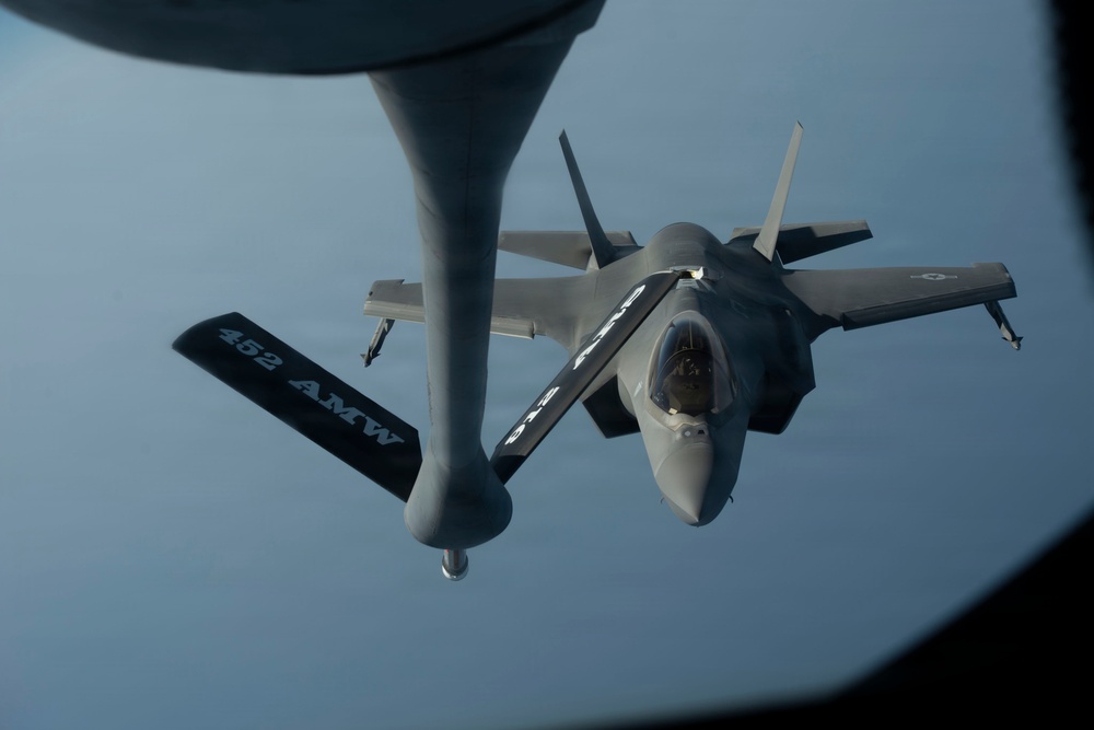 KC-135 refuels fighter aircraft in the CENTCOM area of responsibility