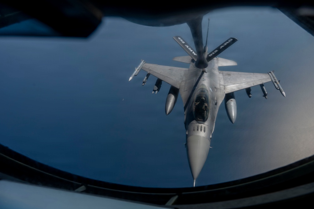 KC-135 refuels fighter aircraft in the CENTCOM area of responsibility