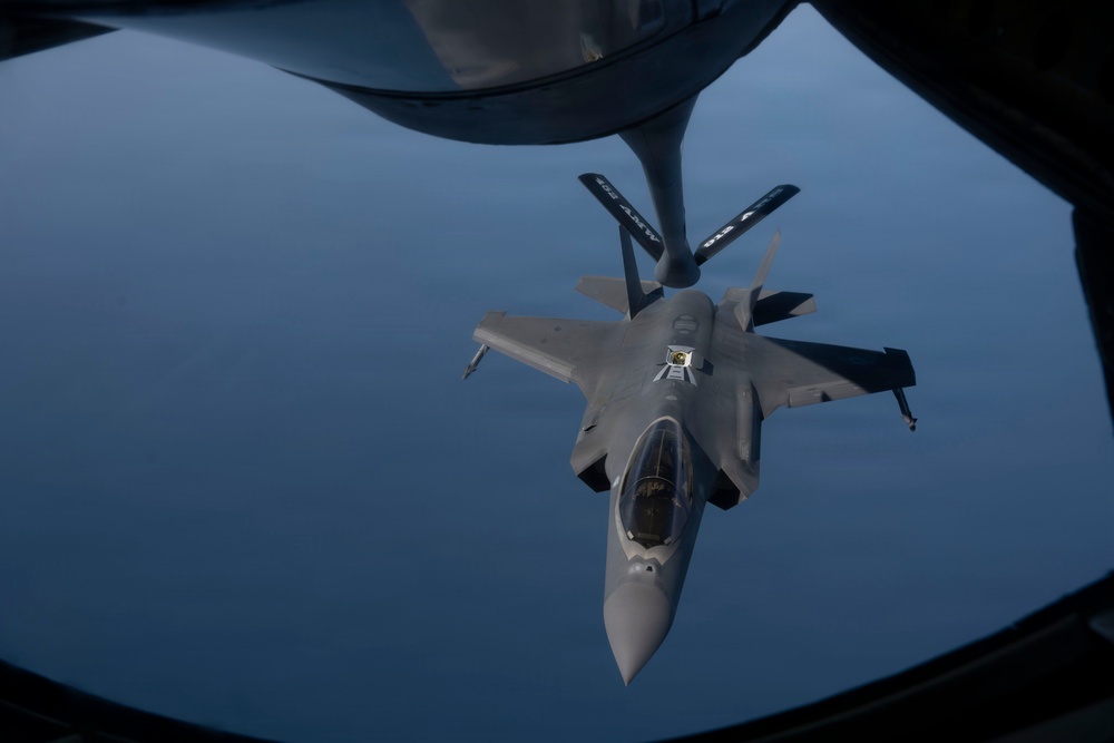 KC-135 refuels fighter aircraft in the CENTCOM area of responsibility