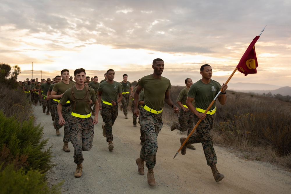 Marines with Alpha Co. and Corporals Course 4-26 Participate in Medal of Honor Trail Run