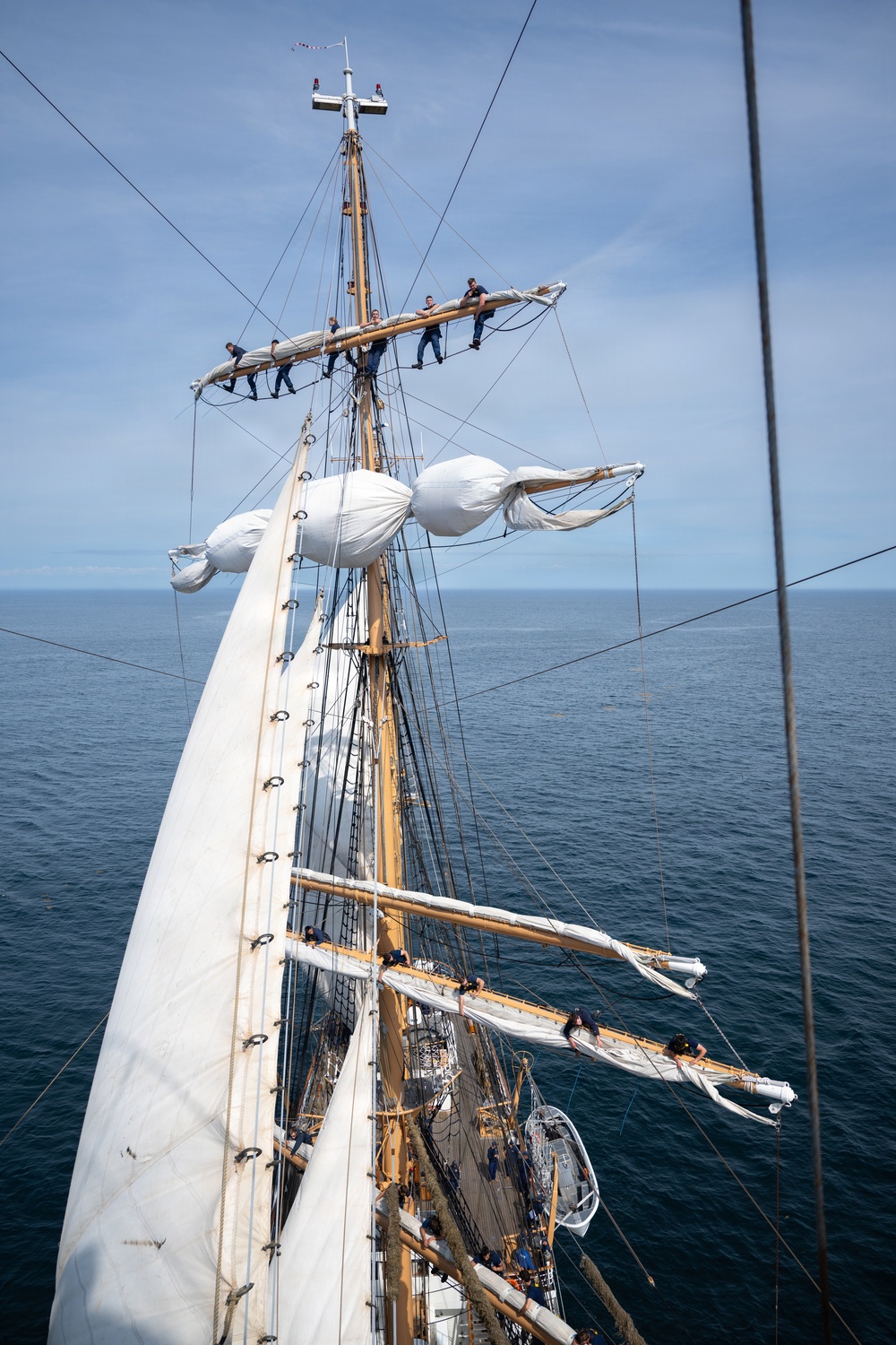 US Coast Guard Academy cadets furl sails aboard Eagle