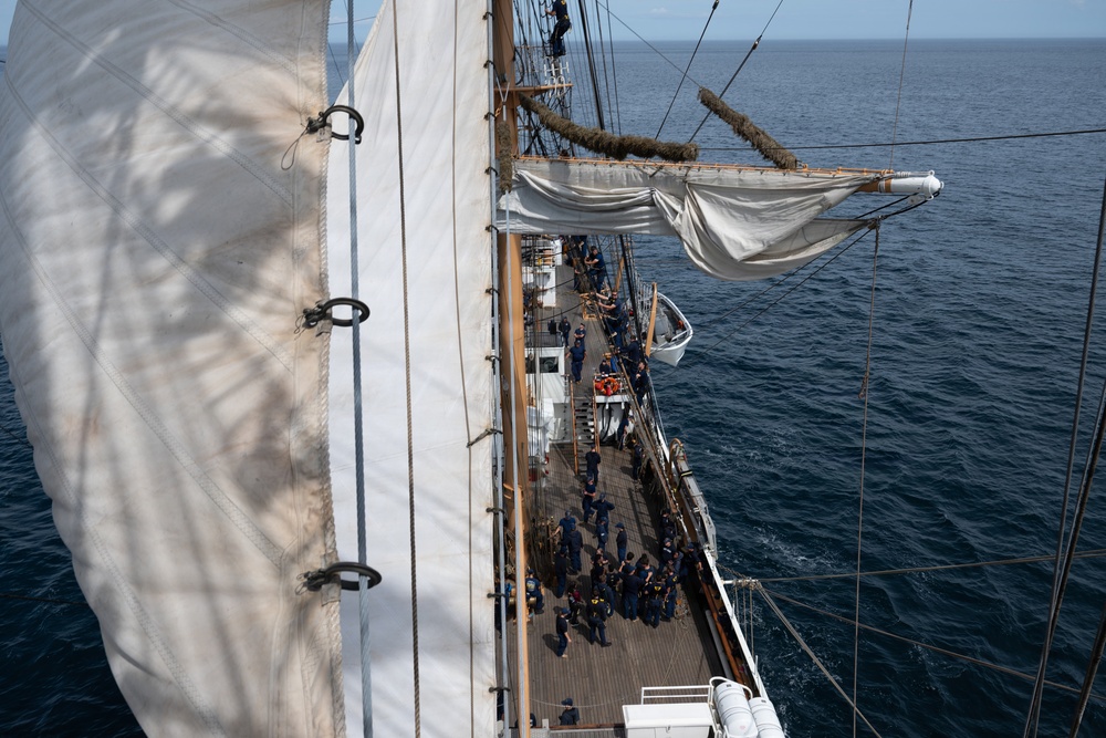 U.S. Coast Guard Academy cadets furl sails aboard Eagle