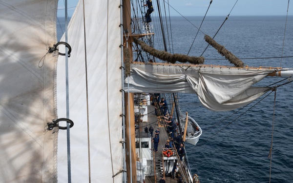 U.S. Coast Guard Academy cadets furl sails aboard Eagle