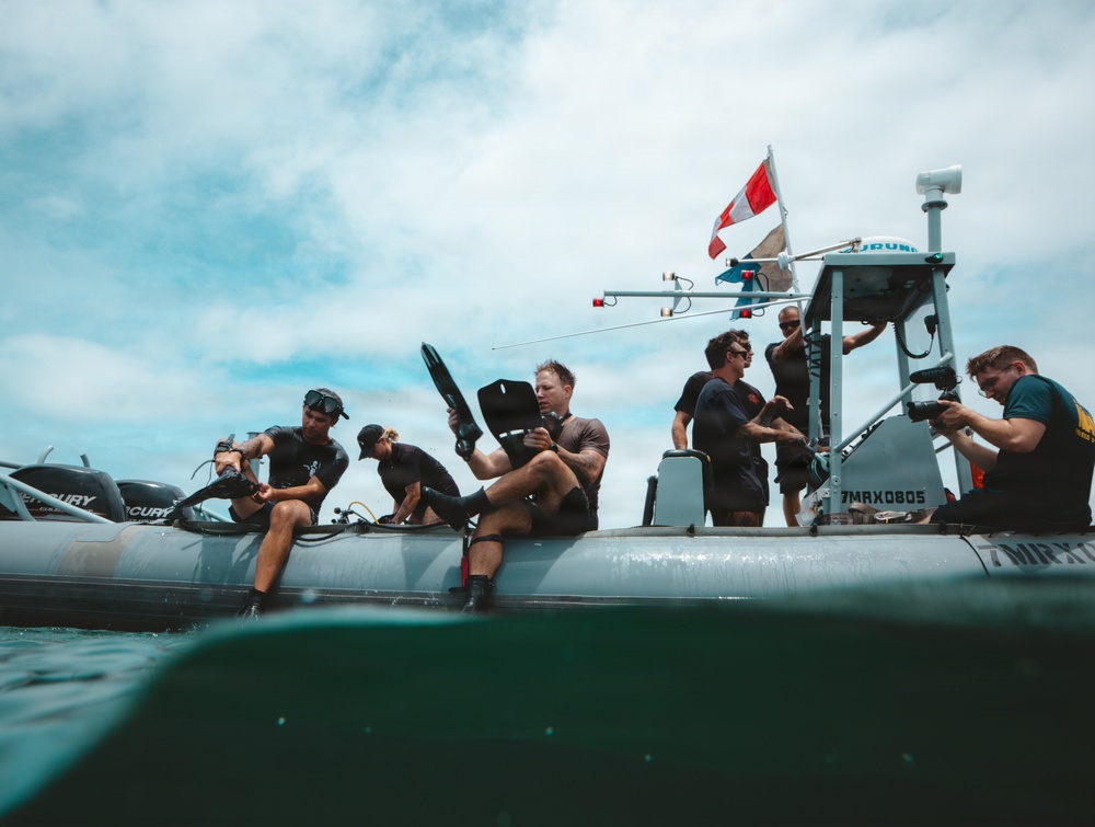 U.S. Navy divers prepare for salvage dive during RIMPAC 2026