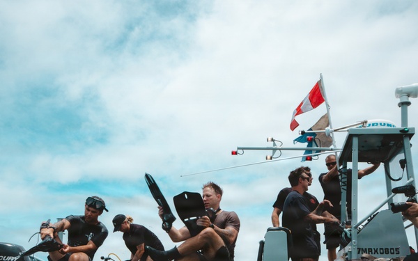 U.S. Navy divers prepare for salvage dive during RIMPAC 2026