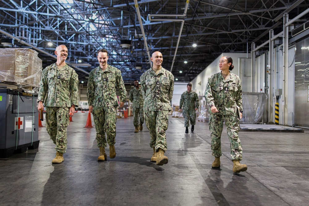 NAVSUP FLC Yokosuka leadership visits Navy Overseas Air Cargo Terminal supporting fleet logistics