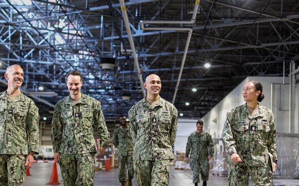 NAVSUP FLC Yokosuka leadership visits Navy Overseas Air Cargo Terminal supporting fleet logistics