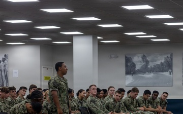 Assistant Division Commander speaks with Midshipmen about leadership to inspire professionalism in their career