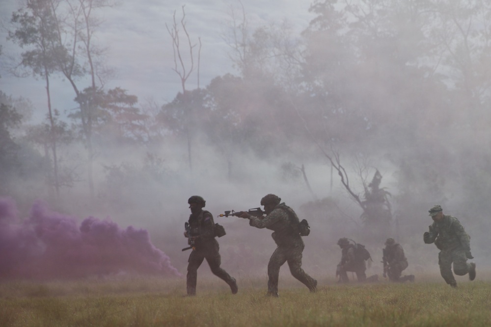 U.S. Army and Malaysian forces join together for a simulated tactical engagement during Keris Strike 26