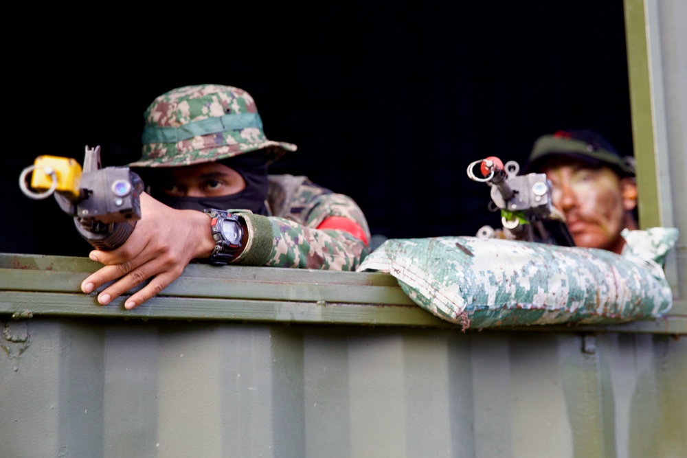 U.S. Army and Malaysian forces join together for a simulated tactical engagement during Keris Strike 26