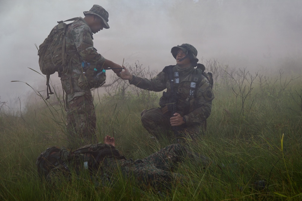 U.S. Army and Malaysian forces join together for a simulated tactical engagement during Keris Strike 26