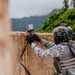 Multinational EOD technicians participate in an IED response drill