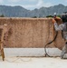 Multinational EOD technicians participate in an IED response drill