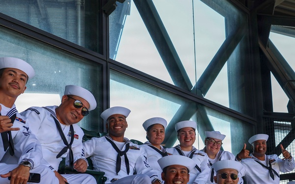 U.S. Navy Sailors attend a Seattle Mariners baseball game during Seattle Fleet Week