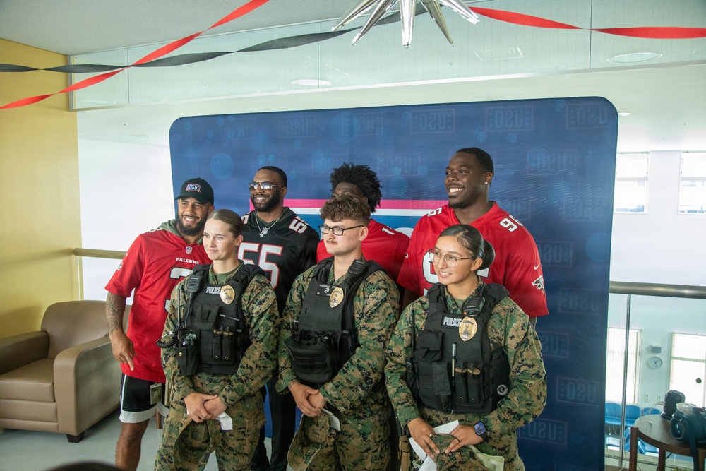 Atlanta Falcon members visit MCAS Iwakuni during a Salute the Troops tour hosted by the USO