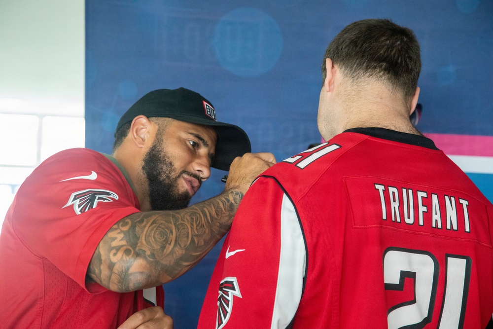 Atlanta Falcon members visit MCAS Iwakuni during a Salute the Troops tour hosted by the USO