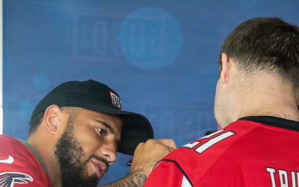 Atlanta Falcon members visit MCAS Iwakuni during a Salute the Troops tour hosted by the USO