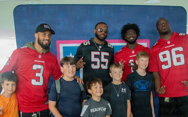 Atlanta Falcon members visit MCAS Iwakuni during a Salute the Troops tour hosted by the USO