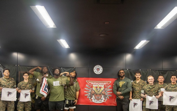 Atlanta Falcon members visit MCAS Iwakuni during a Salute the Troops tour hosted by the USO