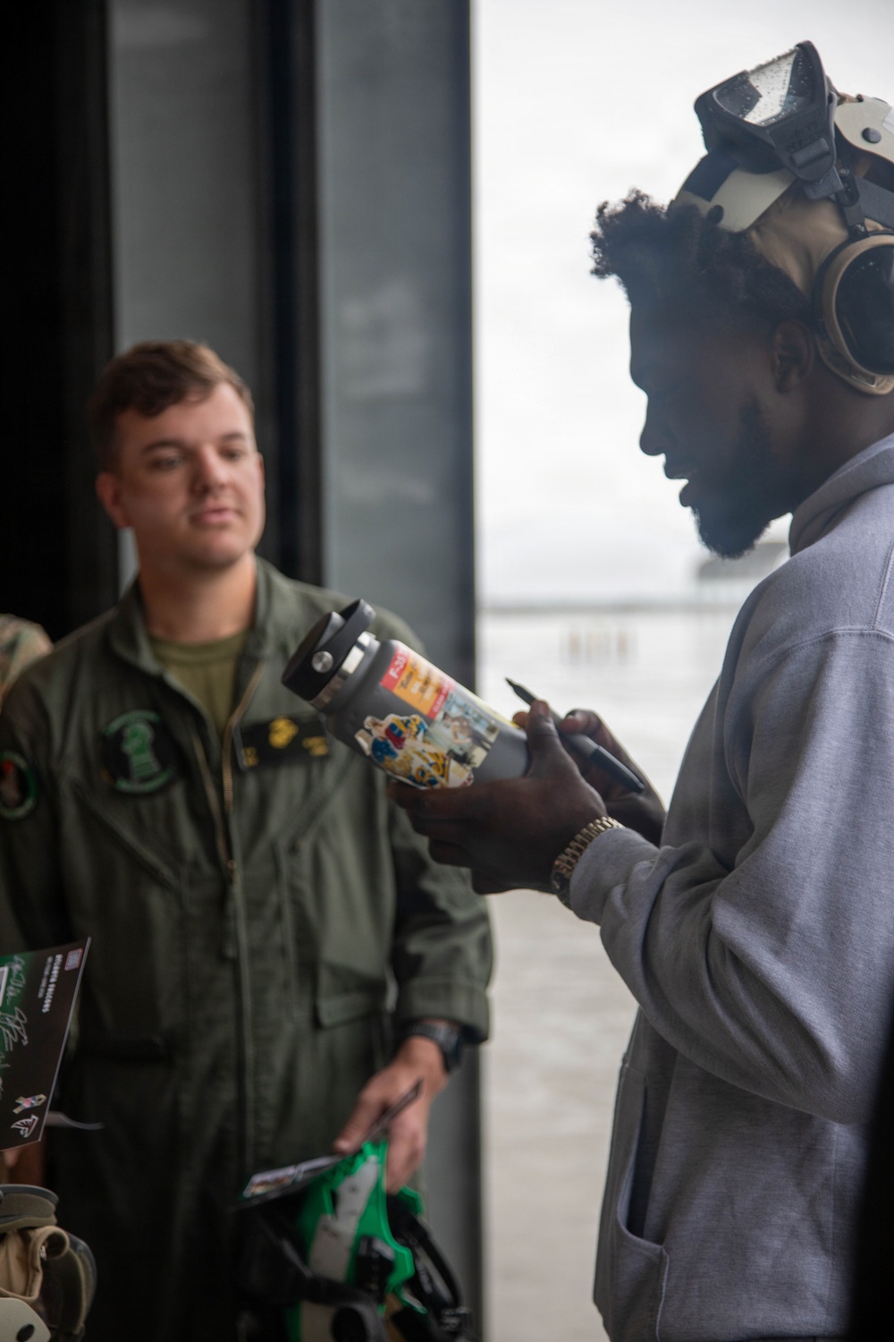 Atlanta Falcon members visit MCAS Iwakuni during a Salute the Troops tour hosted by the USO