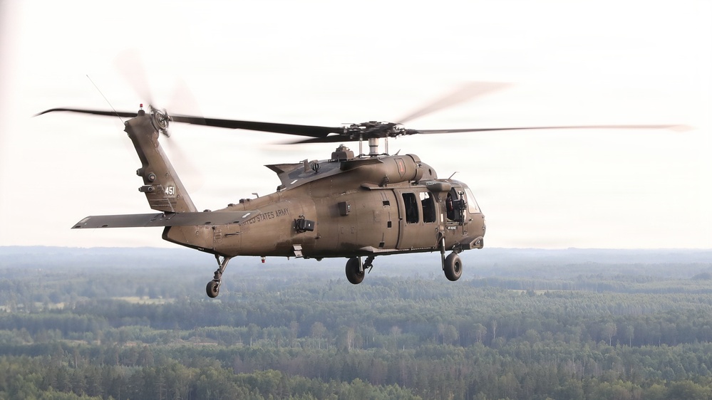 1st Infantry Division Soldiers conduct aerial gunnery qualification