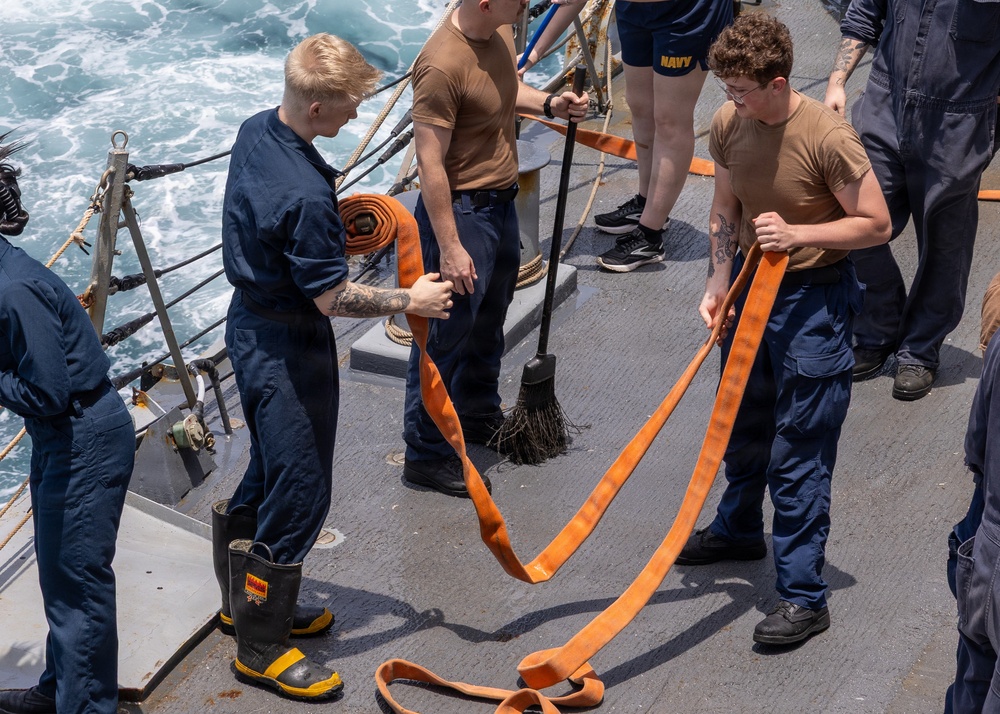 Fresh Water Wash Down Aboard USS Ross