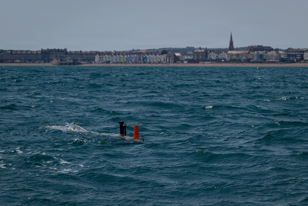 U.S. Navy EODMU8 explosive ordnance disposal technicians deploy and track UUVs during Seabreeze26