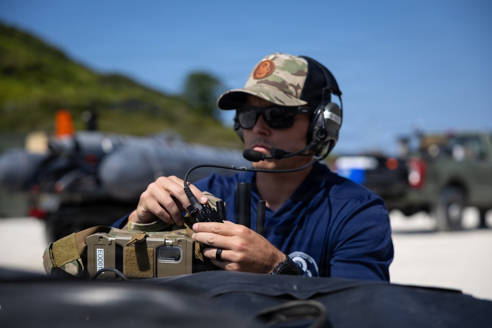 U.S. Navy MNC Matthew Dowlen conducts communications test with the Tactical Operations Center during Seabreeze26